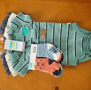 Brand new pack of onesies and socks